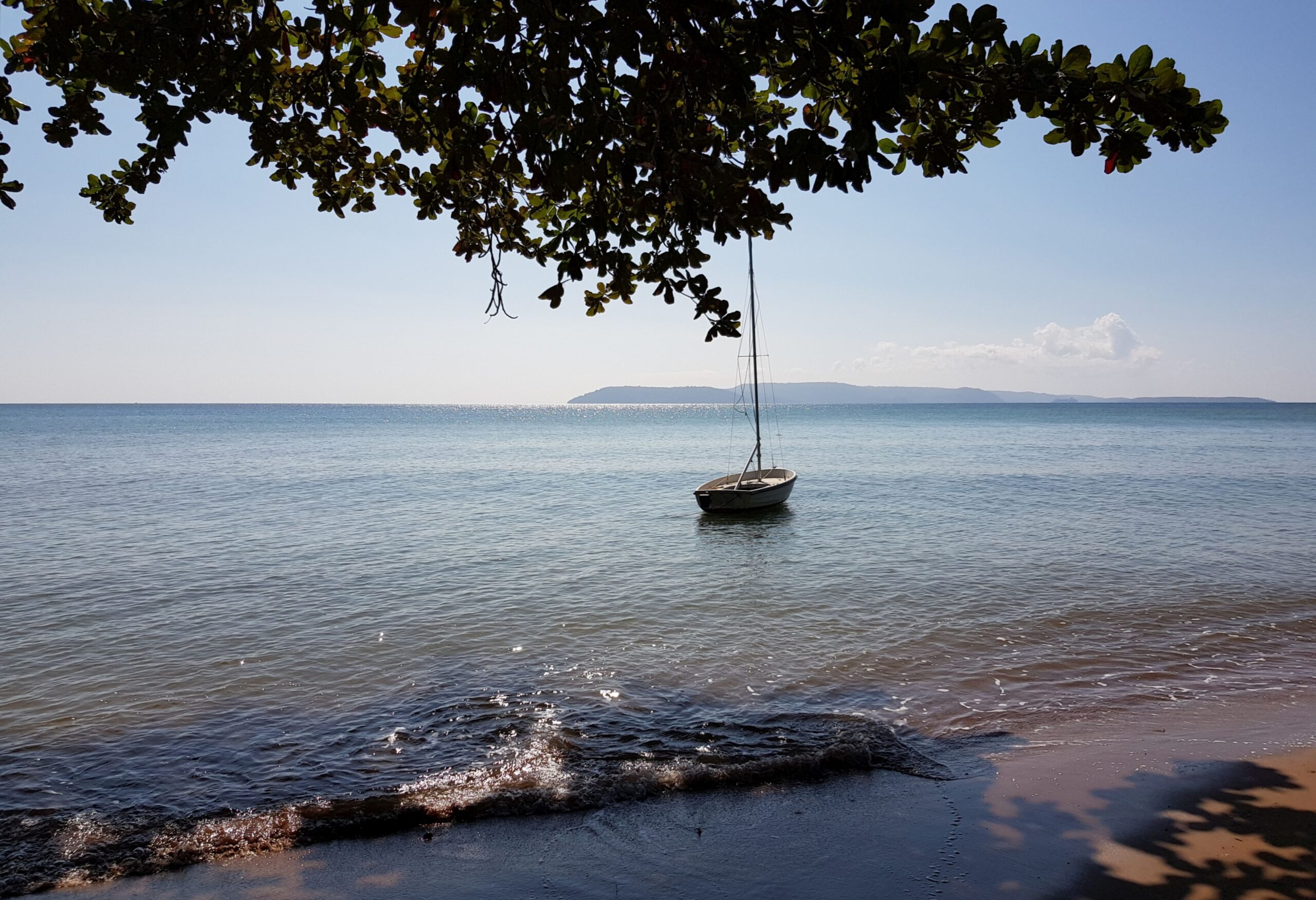 Sailing boat anchored off the coast of Koh Mak, Thailand